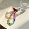 red-orange-and-blue-bead-bracelet-small-red-fabric-piece